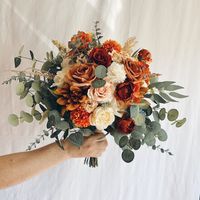 "These romantic silk wedding bouquets are made from faux flowers of rust orange , terracotta, pale pink and light cream, sage greenery, silk eucalyptus, faux pampas. They will make the perfect addition to your big day!  This bridal bouquet consists of silk roses, peonies, ranunculus, hydrangeas and dahlias, green silk eucalyptus and sage greenery and fillers. The stems are wrapped in twine. The bridal bouquet pictured is 14\" (36 cm). Bouquet Size Available: Bridal Bouquet- 14\" (36 cm) Bridesma