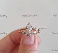 ✥ Ring Details ✥ ✦ Handmade ✦ Material: 925 Sterling Silver, 10K/14K Gold (can be made in white/rose/yellow gold) ✦ Center Stone: Stimulated Diamond/Moissanite ✦ Center Stone Weight: 1.0 Carat Approx. ✦ Band Stone Weight: 0.50 Carat Approx. ✦ Cut: Marquise Cut ✦ Color: Colourless ✦ Clarity: VVS1 ✦ Cut Grade: Excellent ✦ Eco Friendly ✦Made to Order ✥ PRODUCTION ✥ We are jewelry artisans and manufacturers. Every Jewelry is made from the very scratch, and made by hand and carefully polished especia