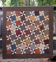 Very simple and quick quilt.  This pattern is about fabric choice.  Make your pinwheels stand out by choosing a light fabric and a dark fabric for the pinwheels. Then choose a medium or dark fabric for the 1-piece block.