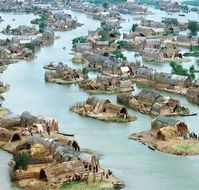 By The Rivers Of Babylon. Mad'an village in Mesopotamian Marshes, Iraq. The marshes, know as Hor by the Marsh Arabs or Mad'an, are formed by the confluence of the Tigris and Euphrates rivers a few hundred miles south of Baghdad in southern Iraq. Most Marsh Arabs lived in arched reed houses considerably smaller than a mudhif. The typical dwelling was usually a little more than 2 meters wide, about 6 meters long, and a little less than three meters high, and was either constructed at the waterside