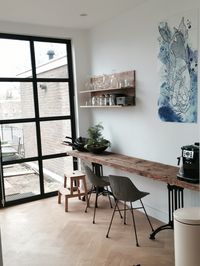 One side of our kitchen has this lounge-vibe that contrasts the functional side of the kitchen. A place for guests to sit down while we cook up dinner #kitchen #industrial #skogsta #blue #interior #metal #frenchdoors