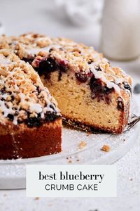 Filled with blueberries and drizzled with vanilla glaze, this homemade crumb cake is the perfect recipe for blueberry lovers. With a moist tender crumb and plenty of rich vanilla flavor, this cake reminds me of the best blueberry coffee cake.

The batter comes together quickly in a stand mixer fitted with the paddle attachment and is the perfect base for the sweet blueberry layer (swirls of blueberry preserves and fresh blueberries). Topped with buttery crumble and baked until beautifully golden, each bite is scrumptious down to the last crumb. Save this pin to try it!