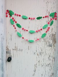 Holly Garland, Paper Garland, Christmas Decoration, Christmas Garland, Holiday Decorations, Holly Leaves, 10 feet long by smileywileys on Etsy https://www.etsy.com/ca/listing/266373265/holly-garland-paper-garland-christmas