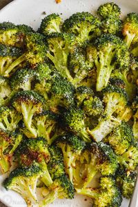 The easiest Roasted Broccoli Recipe. Broccoli florets tossed with oil, salt, pepper, and garlic, then roasted until golden and crisp-tender.