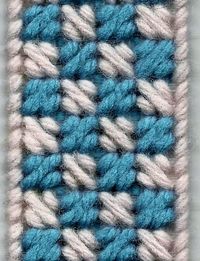 Bookmark  made using the Mosiac Stitch. Size is 10 threads by 36 threads (9 holes x 35 holes)  using  7 count clear plastic canvas. I u...