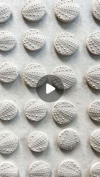 Amber Faktor on Instagram: "Squishy, squishy urchin shells. 

These will end up as magnets, because we all have stuff to hang on the fridge (currently ours is covered in toddler art), so why not make them extra beautiful?

#SunfishStudio #Magnets #SeaUrchin #OceanArt #Satisfying #PotteryReel #ClayMagnet"