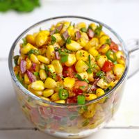 Corn Chaat is a vegetarian Indian snack. Learn how to make truly delicious sweet corn chaat in a few simple steps.