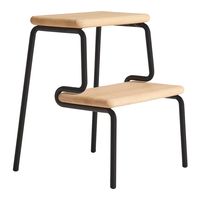 Woud’s Slalom step stool playfully combines a winding, black steel frame with sturdy steps made of white-lacquered oak. This easily movable, multifunctional stool is perfect as a reaching aid in the kitchen, a minimalist nightstand table in the bedroom, or as a plant stand in a living area.