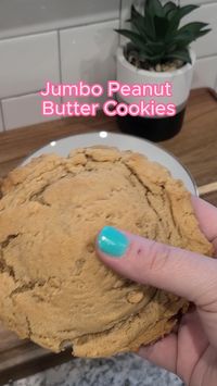 Jumbo Peanut Butter Cookies Indulge in the perfect blend of buttery goodness and creamy peanut butter with these irresistible Jumbo Peanut Butter Cookies. #peanutbutterlove #cookiecraving #jumbocookies #peanutbuttergoodness #homemadebaking #sweettreats #crunchyornot #bakingfromscratch #irresistiblecookies #comfortfood #deliciousdesserts #copycatcookies #simplytreatsandeats