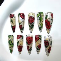 Dive into spring with our Enchanted Rose Press-On Nails. Hand-painted with vibrant red flowers symbolizing passion and elegance, these nails offer a touch of luxury for any size and shape. Effortlessly chic, perfect for weddings or celebrating spring's beauty.📦 What comes with your press on nail kit? 10 nails of your size 24 adhesive tabs 1 nail file 1 cuticle stick Instructions on how to apply and remove them. Finding Your Size:Check out our sizing chart or Visit our sizing tutorial here: Sizi