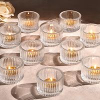 PRICES MAY VARY. 🎁Small Candle Holders Set-Great home decor: Our mini tea candle holders with special pleated stripes design, emit dazzling candlelight. Votive candles are so small that you can place them pretty much anywhere, and they add a welcoming glow throughout the house. 🎁Unique Design-Clear Tealight Candle Holder: Lanttu candle holders are designed with thick glass, high quality and suitable for daily continuous use. When lit, it emits warm and beautiful light, bringing you a beautiful atmosphere and mood. 🎁Candle Holders for Table Centerpiece-Catch your eyes: Lanttu small tea light holder, brings you not only charming candlelight, but also a sense of ritual in life. Fit for Wedding, Housewarm, Proposal, Engagement, Birthday party, Baby shower, Thanksgiving, Christmas, and other