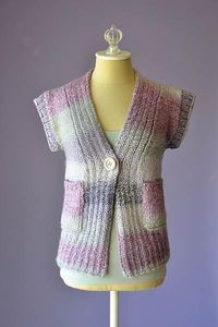 Cake Cardi Designed by Universal Yarn Design Team SIZES Extra Small (Small, Medium, Large, 1X, 2X, 3X) FINISHED MEASUREMENTS Bust: 31½ (35, 38, 41½, 45, 48½, 52)" MATERIALS Universal Yarn Major (100% acrylic; 200g/328 yds) • 108 Whirl - 2 (2, 2, 2, 3, 3, 3) balls Needle: US Size 10½ (6.5 mm) straight or size needed to obtain gauge US Size 9 (5.5 mm) straight Notions: Tapestry needle, stitch marker, removable stitch markers, 1…œ" button GAUGE 14 sts x 18 rows = 4" in St st using larger ndl Save t