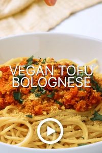 This Tofu Bolognese recipe is to die for. The tofu crumbles are a game changer! Quick, easy, healthy, vegetarian, vegan, gluten-free, hearty, and lick the bowl scrumptious. Just like traditional bolognese but better. #itdoesnttastelikechicken #veganrecipes #veganpasta #pasta