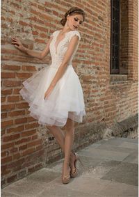 Home » Wedding Dresses » The Most Popular Short Wedding Dresses on Pinterest » Ivory short wedding dress crafted in tulle