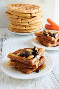 Carrot cake waffles are all the flavors of carrot cake in a waffle form. This carrot cake waffle recipe is easy and makes a fantastic breakfast. #waffles #carrotcake #recipe #breakfast #homemade #fromscratch #carrot