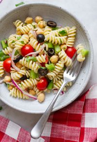 This Quick & Easy Vegan Pasta Salad recipe whips up fast using a few simple ingredients, all tossed with a simple vinaigrette, it’s customizable, can be made ahead of time and of course - it’s absolutely delicious! Perfect for lunch, dinner, make ahead meal prep meals, as well as potlucks, picnics, BBQ’s and parties!