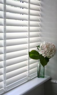 Our Deluxe Puritan Wooden blind certainly gives a room a lovely finish. Add tape to create impact. www.web-blinds.com