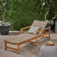 Make your weekends greater by spending relaxing afternoons in the warm sunshine. Our chaise lounge features rich acacia wood frames that is complemented by wicker seating.