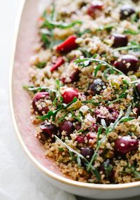 Cherry, Pistachio + Mint Quinoa Salad - Quinoa tossed with juicy cherries, nutty pistachios and fresh mint and dressed with a simple apple cider dressing, it tastes AMAZING and is so easy to make! Great as a side or main, lunch or dinner, meal. Vegan, gluten free, low fat recipe