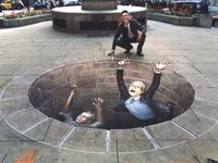 3D drawings on asphalt.