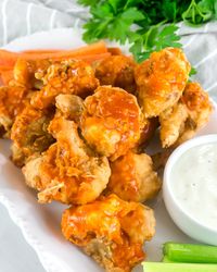 Buffalo Cauliflower Wings is a great appetizer for parties. Its light and crispy, tossed in homemade buffalo sauce.