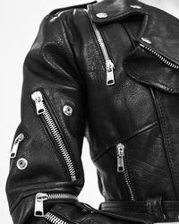 A detail of the multi-zip leather biker jacket from Pre Spring/Summer 2018, photographed during fittings.