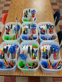 Just made art bins for every art table. Bins are shower caddies from walmart $2.67. The plastic cups came from dollar tree store in a set of 6. It took 2 hours to replace everything, and refill glue bottles but definitely worth the organization for all of my junior high students.