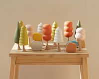 This set of five colorful wooden trees is perfect for pretend and imaginative play, as well as home decor in any room of the house!. All five trees are handmade using solid beech and ash wood. They are hand-turned on the lathe, sanded until super smooth and polished with natural beeswax. The high quality of materials and craftsmanship ensure that they will be enjoyed for years to come! The colors and beeswax used conform to EN71-3 standard for toys. The set can complement our wooden playsets as