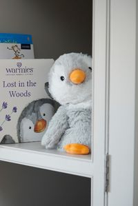 The Warmies Junior Grey Penguin will keep you warm this winter. The Junior Soft Toys offer all the benefits of our large plush toys, with the added advantage of being the perfect size of 9” for a small gift, or even a stocking filler when the festive period comes around.

Measures 9” (22cm)

Soothes, Warms and Comforts.

Scented with French Lavender.

Chill in a Freezer for Cooling Relief.

Suitable for all ages.

Surface clean regularly with a lightly damp cloth, allow to dry at room temperature. DO NOT IMMERSE IN WATER.

