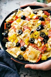 Four Cheese Ravioli Salad with pepperoni, provolone, artichoke hearts, olives, and Italian seasoning + dressing. This is such a crowd pleaser!