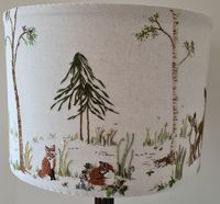 Create your own Woodland scene on a lampshade frame.  This lamp has that country charm that would look equally gorgeous in a country living room, a bachelor's pad, or child's nursery. The embroidery is INTERMEDIATE TO ADVANCED: all the stitches are common embroidery stitches, but experience with long and short stitch (thread painting) is necessary. Please do not attempt this project if you are new to embroidery or not a confident stitcher. It can be embroidered then wrapped and stitched to a met