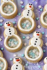 Snowflake Filled Snowman Cookies are decorated with White Candy Melts and Snowflake Sprinkles from @hungryhappening | Christmas Cookie Recipes