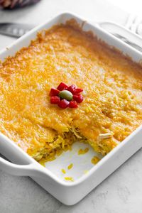 Cuban Arroz Imperial! A classic Cuban comfort food dish made with layers of yellow rice, shredded chicken, mayonnaise, and melted cheese.