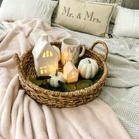 Woven serving tray and cozy blanket from Target + fall accents 💕 #StayHomeWithLTK #LTKhome #LTKunder50