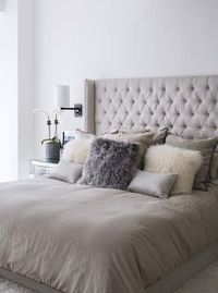 Oversized headboards are very important focal points in bedrooms, they create focus and offer a subliminal sense of support