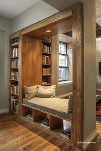 Let’s check out this transitional feature. What a clever way of combining leisure and storage!