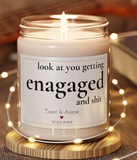 Custom Engagement Gift, Personalized Engagement Gift, Engaged Candle, Bridal Shower Gift, Funny Engagement Gift Bride to Be, Wedding Gift Personalize with their first names and the engagement date to mark the occasion.  Packed with immersive aromas, these scented candles come in 9oz glass jars and are one size (2.8″ × 3.5") (7.1cm × 8.8cm). Made with 100% natural soy wax blend, each candle features a 100% cotton wick and a permanent adhesive label where your custom designs can come alive. .: Mat