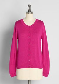 Have you been pining for a stylish pink sweater to add a dash of darling to your wardrobe? This classic cardigan is truly the best, thanks to its super soft, hot pink-hued knit Slip this easy fit cardigan sweater over any ensemble for a look that's unequaled in both function and flair!