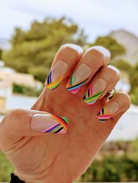 A bright and colourful nail set hand painted with a multicoloured striped themed French tip design. Made to order nail set.  Hand painted using quality gel nail polish and topped with a protective top coat to ensure longevity. What's included- * Set of 10 nails with the pictured design  Prep Kit * 1 Mini Nail file * 1 Cuticle Pusher Stick * 1 Prep & Shine Wipe * 1 Liquid Nail glue * 1 set of 24 nail glue stickers This nail set can be purchased in sizes Xsmall to Large (see photo for sizing infor