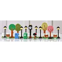 Exclusive for Herrschners Plastic Canvas Village Club members! Add the delightful details of village life to your club buildings with this accessory kit! Designed to supplement the Herrschners Plastic Canvas Village Club buildings, this exclusive 21-piece plastic canvas kit includes picket fences, lamp posts, trees, benches, mailbox, letter box, newspaper box, and a center square clock. Its everything your village display needs to complete the look! Kit includes 7-mesh plastic canvas, acrylic ya