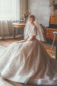 15 Statement-Making White Winter Wedding Dresses With Sleeves - Praise Wedding