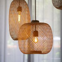 NEW - Available in a black shade here : https://www.etsy.com/listing/1026535601/black-bamboo-pendant-light-natural-woven NEW - Available as a freestanding floor lamp here : https://www.etsy.com/listing/881713307/freestanding-bamboo-floor-lamp-handmade The original Lanna Passa classic - a traditionally handwoven Thai bamboo fishing trap, re-purposed into a beautifully minimalistic pendant light. The basket is flexible and can achieve many shapes and positions - the oblong shape is the natural pos