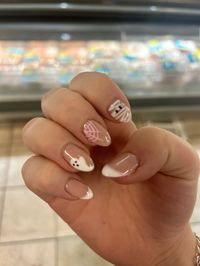 Pink and white mummy ghost and spider web nails french tips and nail art