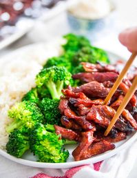 These Chinese boneless spare ribs are just like the takeout recipe. Sticky and sweet with crispy edges and that deep red color. Learn how easily you can make them at home!