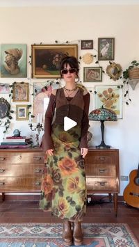 Quirine Brouwer on Instagram: "want to make more fashion content again, i missed it 🌞 

outfit details
dress: @urbanoutfitters 
brown top: @monki (thrifted)
vest: @hm 
boots: @mtngmustang 
bag: thrifted
jewelry: thrifted"