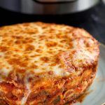 Instant Pot Lasagna is delicious and hearty. No need to pre-cook the pasta. Pressure cooker lasagna is easy to make. simplyhappyfoodie.com #instantpotrecipes #instantpotlasagna #pressurecookerlasagna