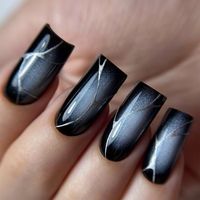 #BlackAndSilverNails #ChicNailDesigns #GlamNailArt #ElegantNails #BoldNailStyles #BlackNails #SilverNails #SparklingNails #NightOutNails #ClassyNailDesigns