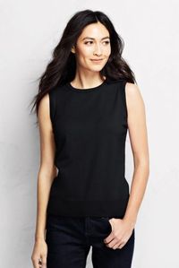 This is an example of a shell top. Typically, a shell is short, sleeveless top with a simple shape and a high neckline...it is often worn under a matching cardigan or jacket.