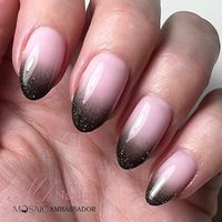 Do you love the look of black ombre nails? Add some glitter nail polish to completely transform them into party ready look! In this article you will find the best nail design ideas for black glitter ombre nails for any nail shape - coffin nails, almond nails or short natural nails. Get inspired!