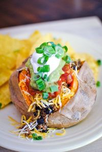 Taco Stuffed Sweet Potatoes are the nutritious Taco Tuesday you’re craving.Baked sweet potatoes are filled with ground beef taco meat and topped with all your taco night favorites! Taco Stuffed Sweet Potatoes are a delicious variation on the usual Taco Tuesday. Ground Beef Taco meat is simmered and then ladled into baked sweet potatoes.